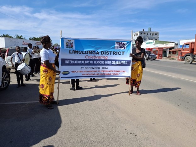 Participants at the flagging off of the match past during the 2024 International Day of Persons with Disabilities